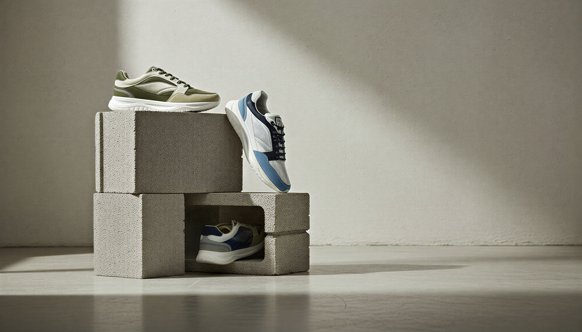 Male model in 2XY limited edition sneakers and outerwear in urban setting